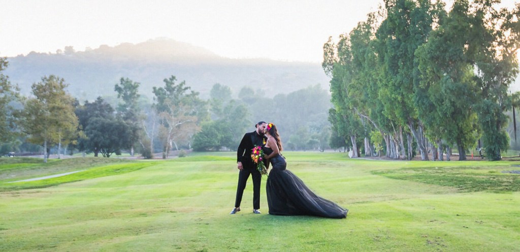 Bride and groom on golf course
